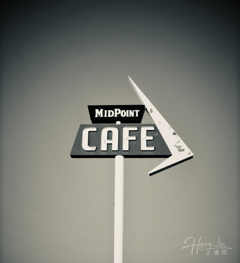 A-vintage-Midpoint-Cafe-sign-against-a-sky