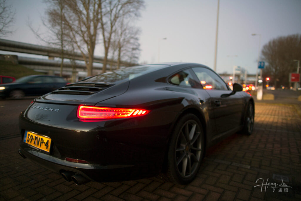 Black Porsche 911 with Glowing Tail Lights Black Porsche 911 with Glowing Tail Lights