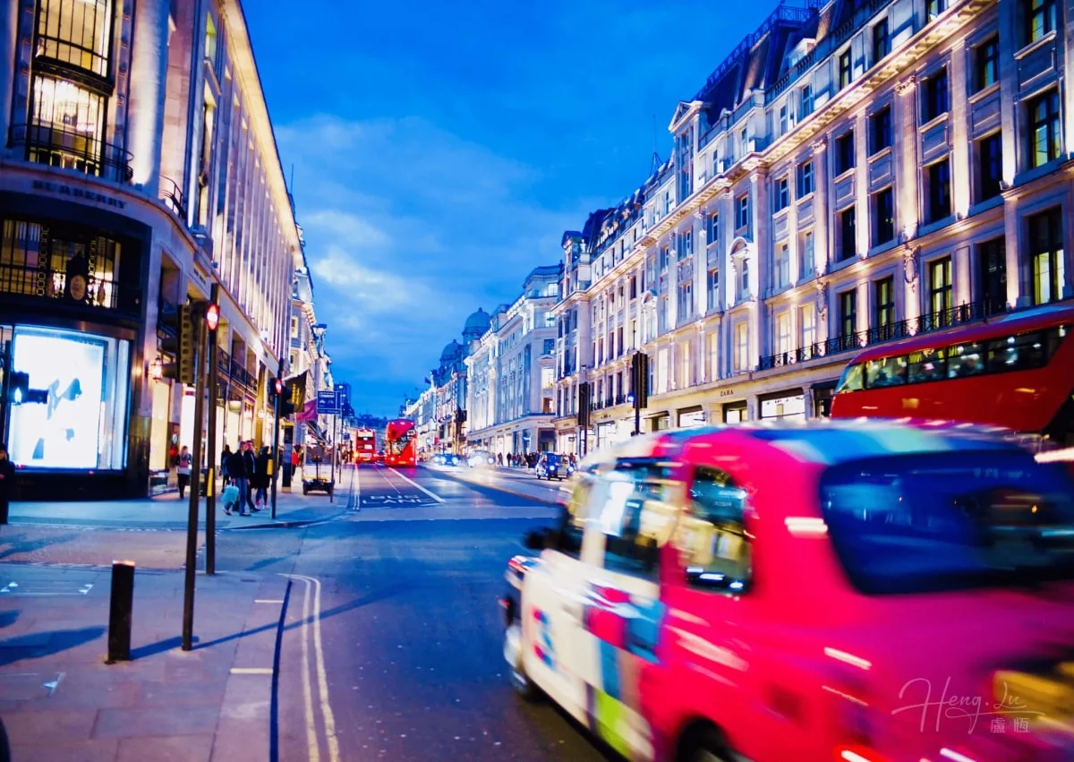 Vibrant Evening Scene on London’s Regent Street with Lights London-night-street-with-cars-and-illuminated-buildings