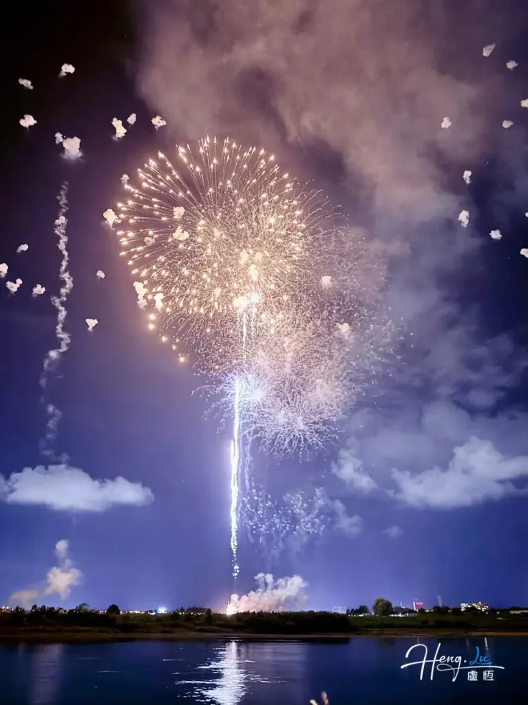 Bright-fireworks-illuminating-night-sky-over-water