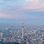 Cityscape-with-prominent-television-tower-at-dusk