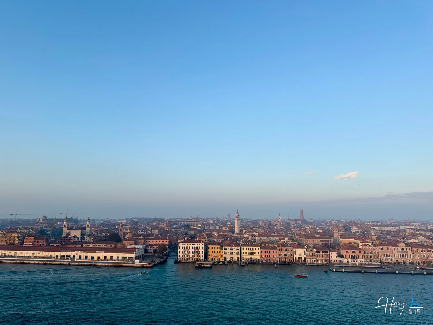 Coastal-cityscape-with-historic-buildings-under-clear-sky