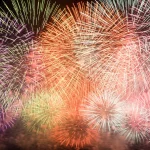 Colorful-fireworks-burst-vividly-illuminating-the-night-sky