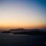 Islands fading beneath a painted sky Evening-haze-over-sea-and-islands