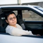 Luheng-sitting-in-car-driver-seat