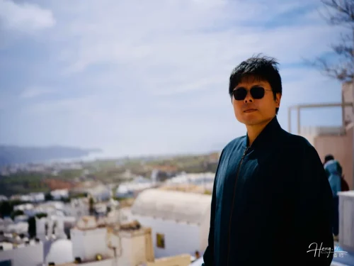 Luheng-standing-outdoors-with-scenic-view (1)