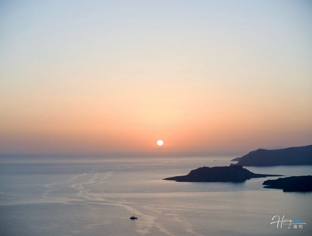 Sunset-over-sea-with-islands-and-boat