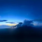 Testing-Mountain-peak-surrounded-by-clouds-at-dawn