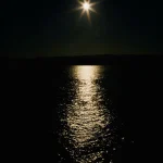 bright-sunlight-reflecting-on-dark-sea-surface