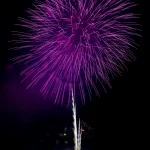 large-purple-firework-exploding-against-night-sky
