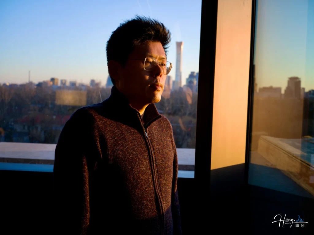 luheng-in-sunlight-looking-outside-modern-window