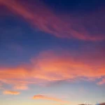 Pastel Clouds During Sunset with Soft Light Gradient in Serene Sky pastel-clouds-during-sunset-with-soft-light-gradient