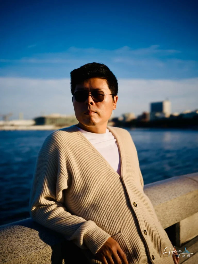 Luheng-in-sunglasses-by-seaside-rail