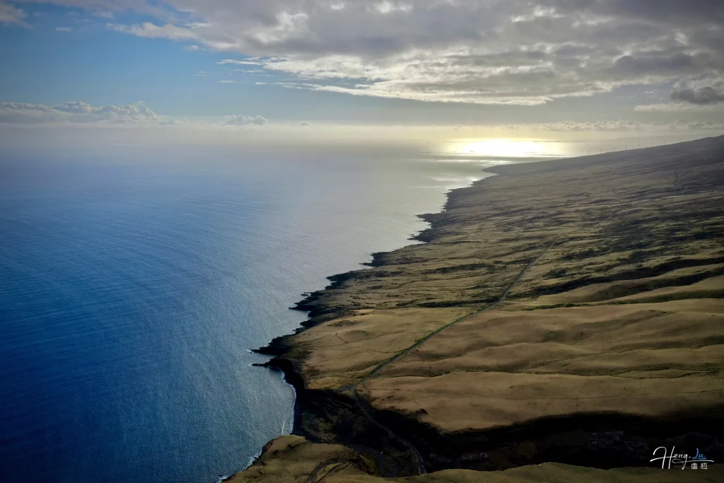aerial-view-of-coastal-cliffs-under-soft-sunlight