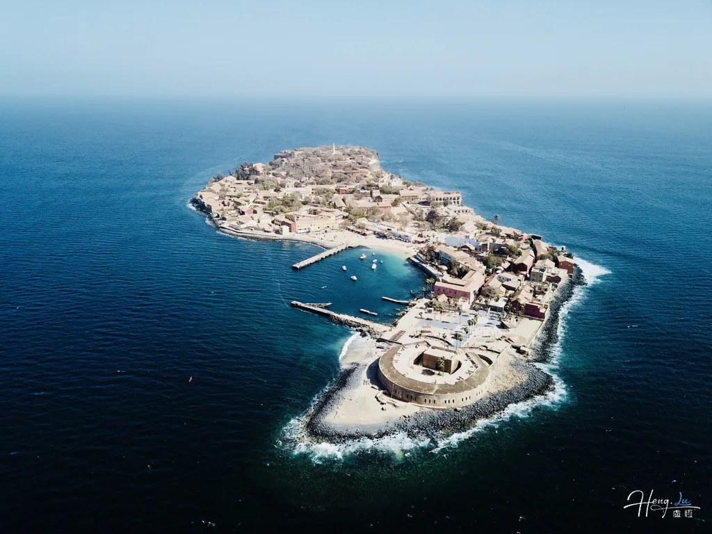 aerial-view-of-island-surrounded-by-deep-blue-sea