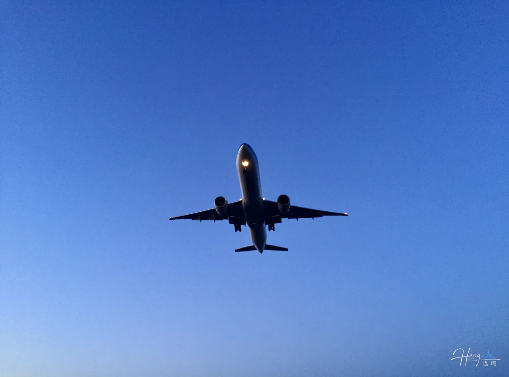 airplane-flying-against-clear-evening-sky