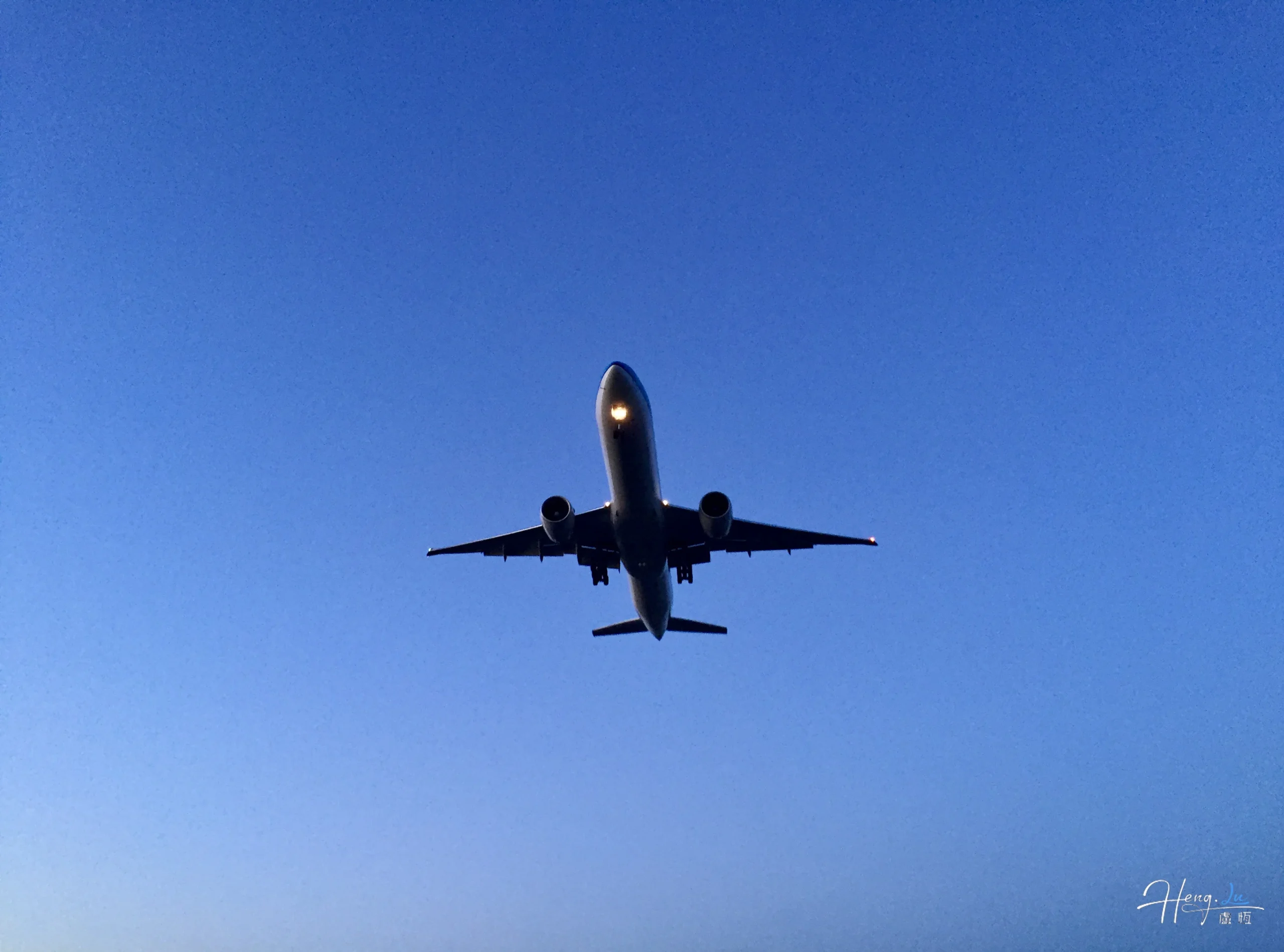 Airplane flying against clear evening sky airplane-flying-against-clear-evening-sky
