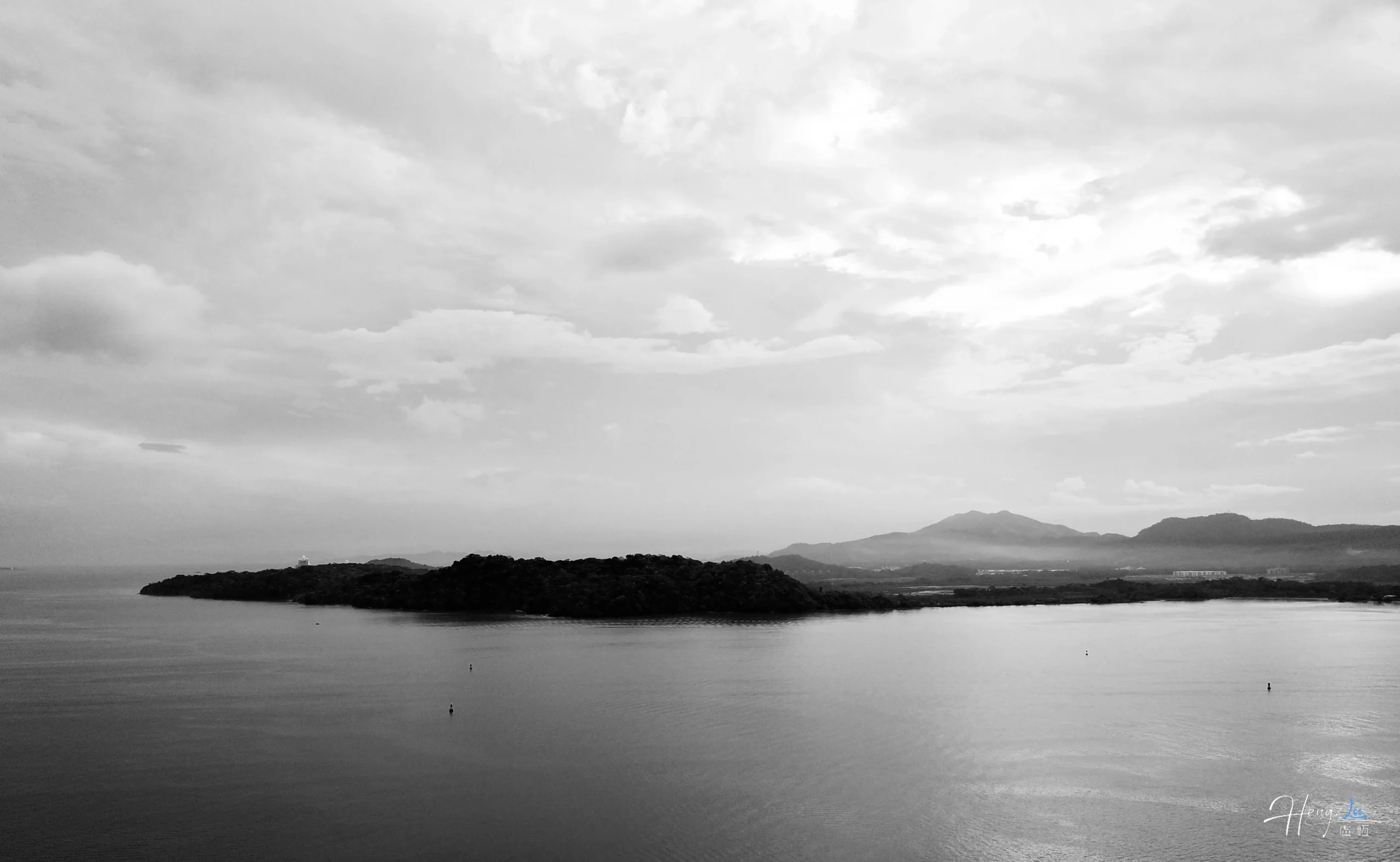 black-and-white-seascape-with-distant-island
