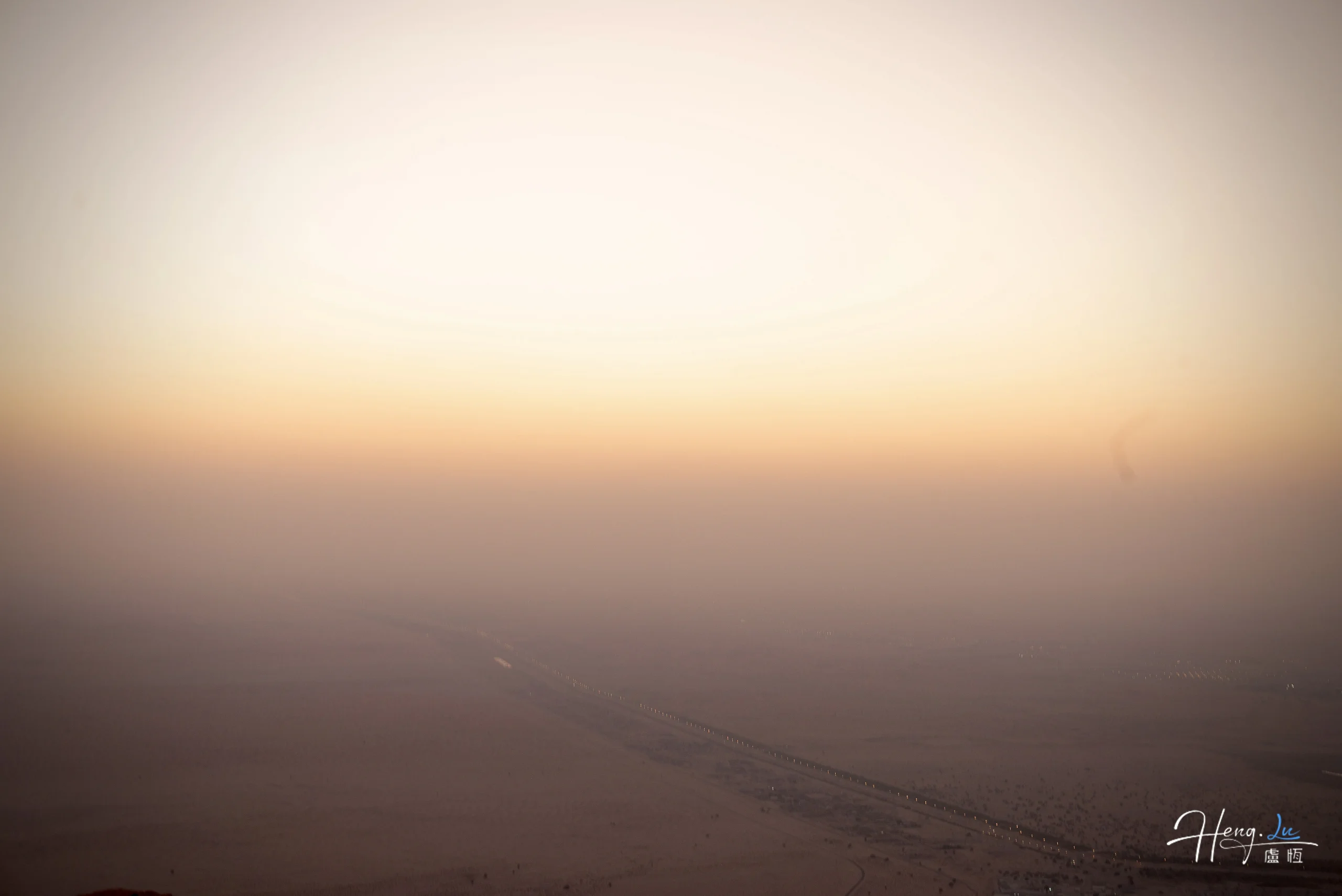 desert-horizon-fading-into-warm-sunset-sky