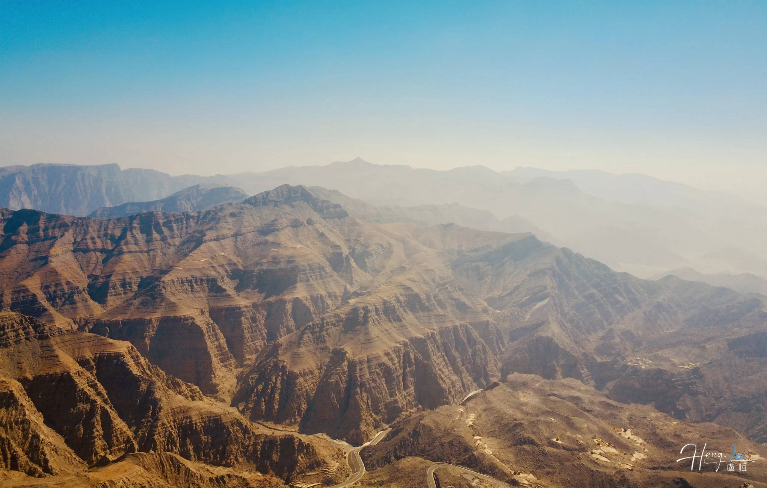 rugged-mountain-range-under-clear-blue-sky