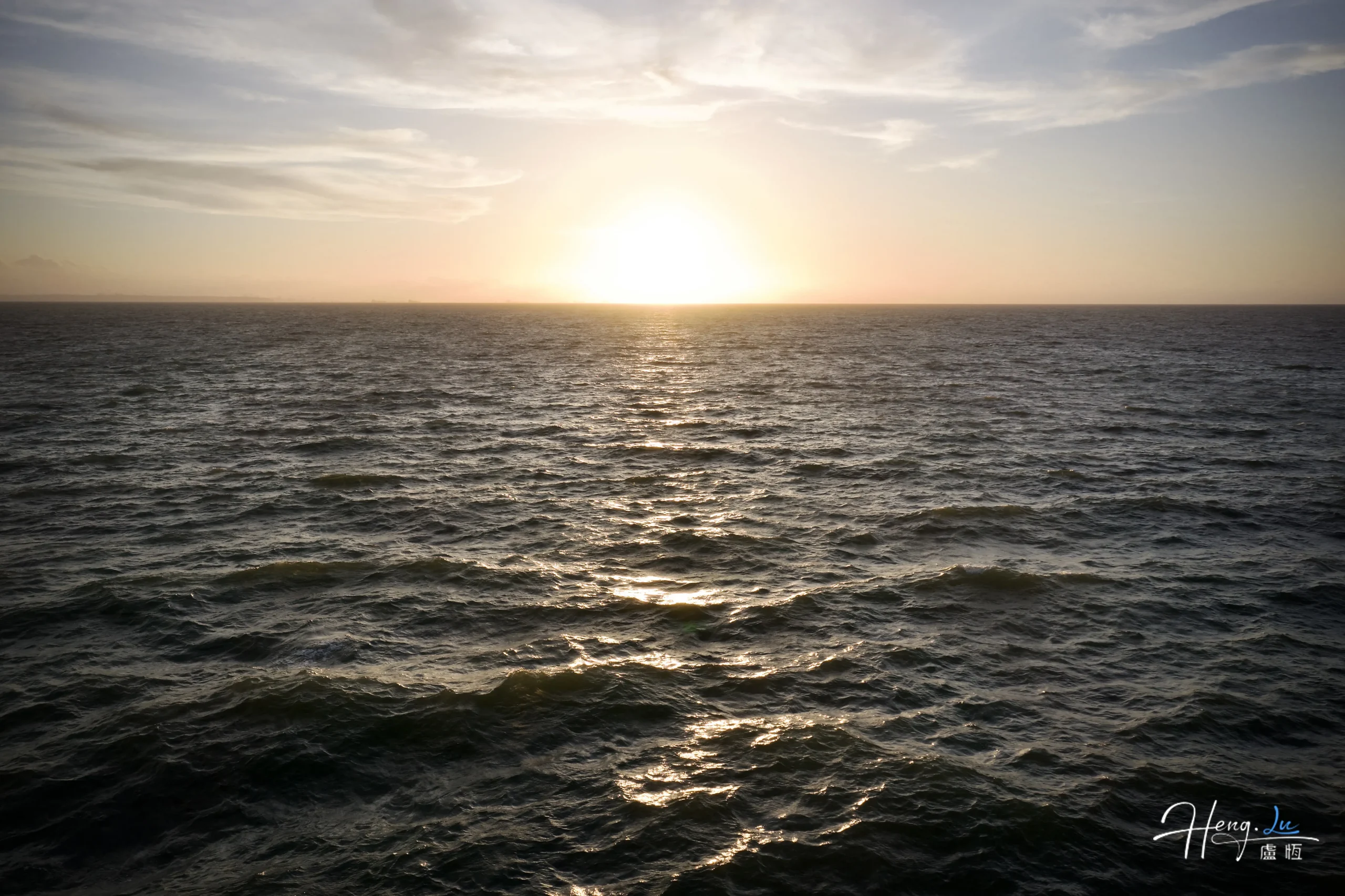 sunset-over-ocean-with-golden-light-reflecting-on-waves