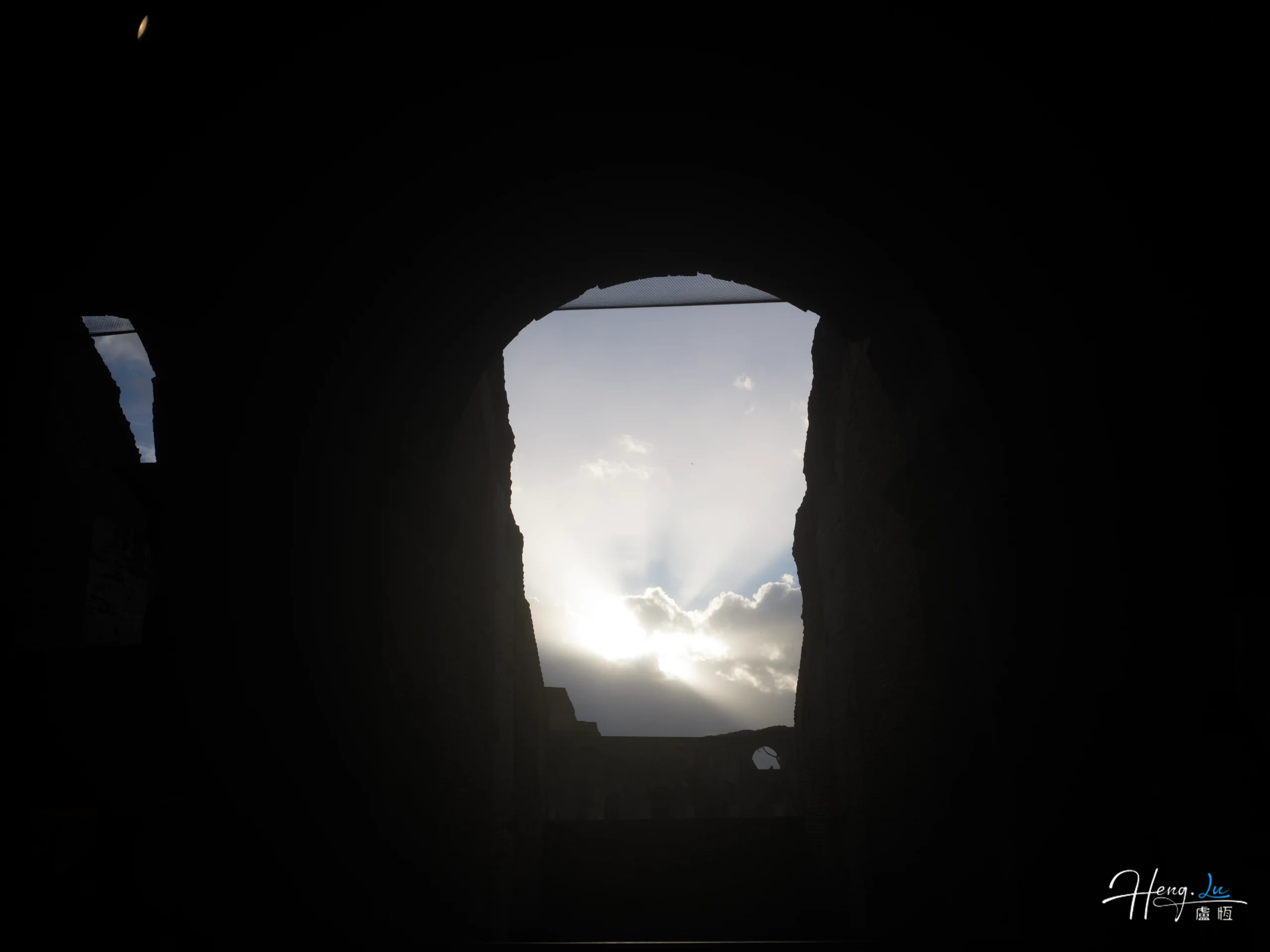sunlight-streaming-through-ancient-archway