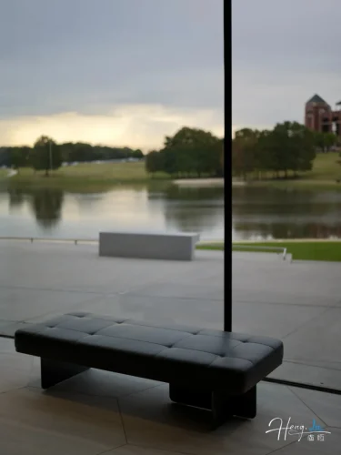 modern-bench-by-window-overlooking-lake