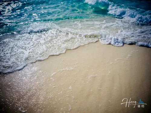 waves-washing-over-sandy-shore (1)